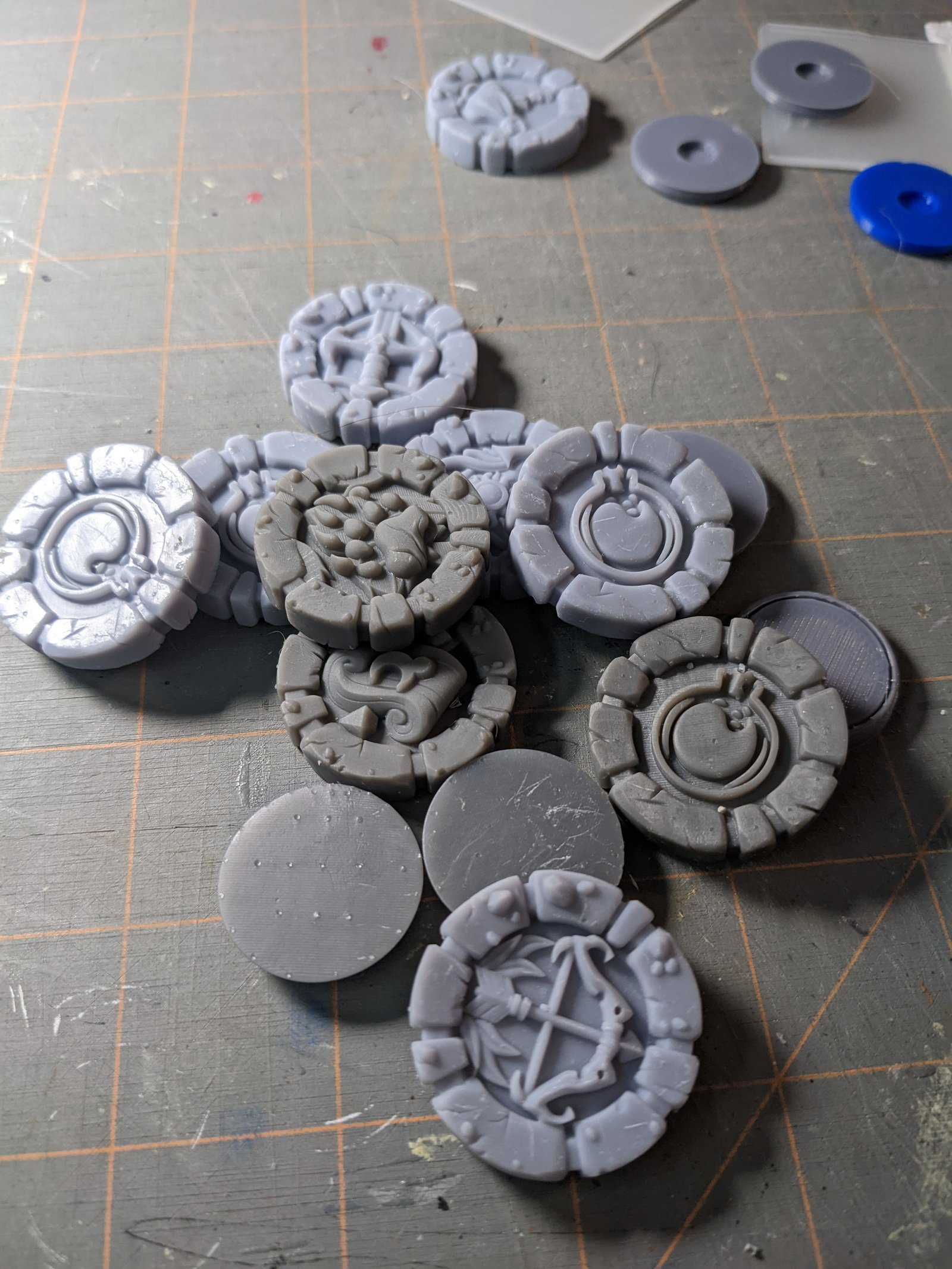 Character class tokens made by castnplay from the Kingdom of Thamarya Kickstarter waiting to be painted