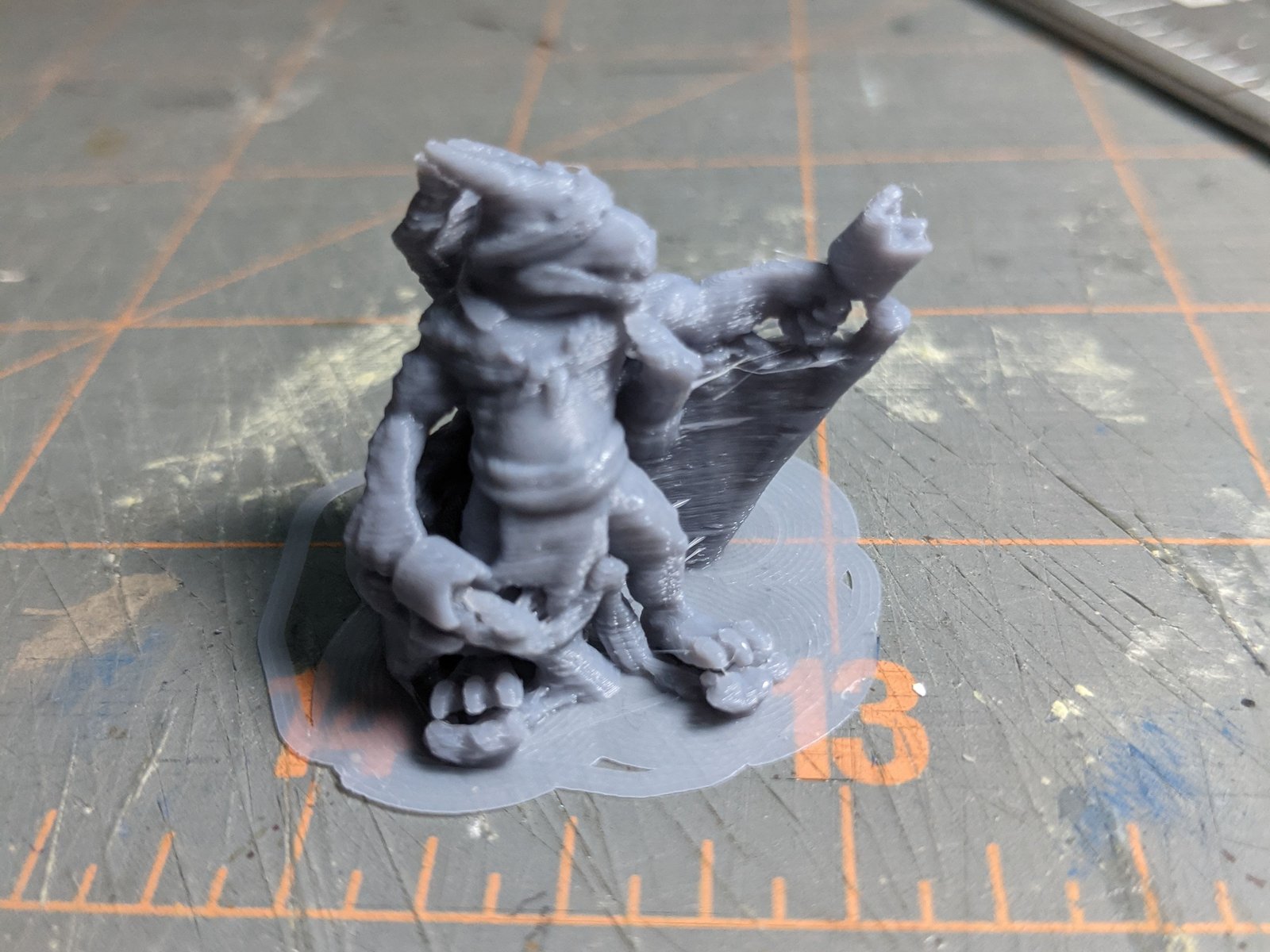 Kobold miniature in supports from FDM Printing