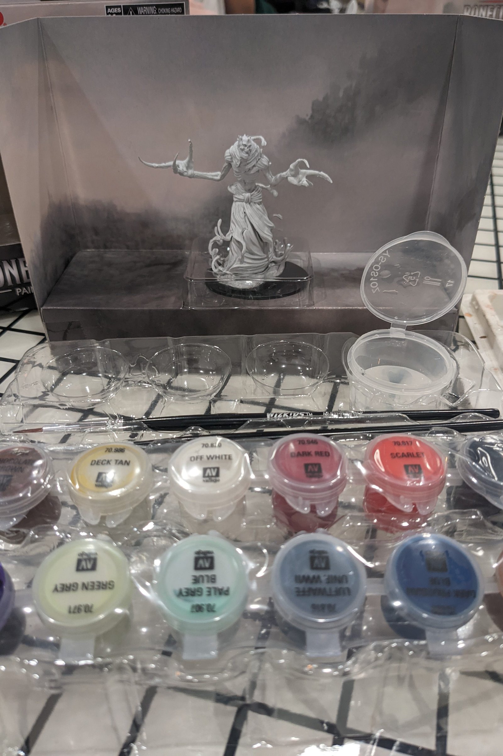 Nolzurs Paint Kit box opened with contents displayed